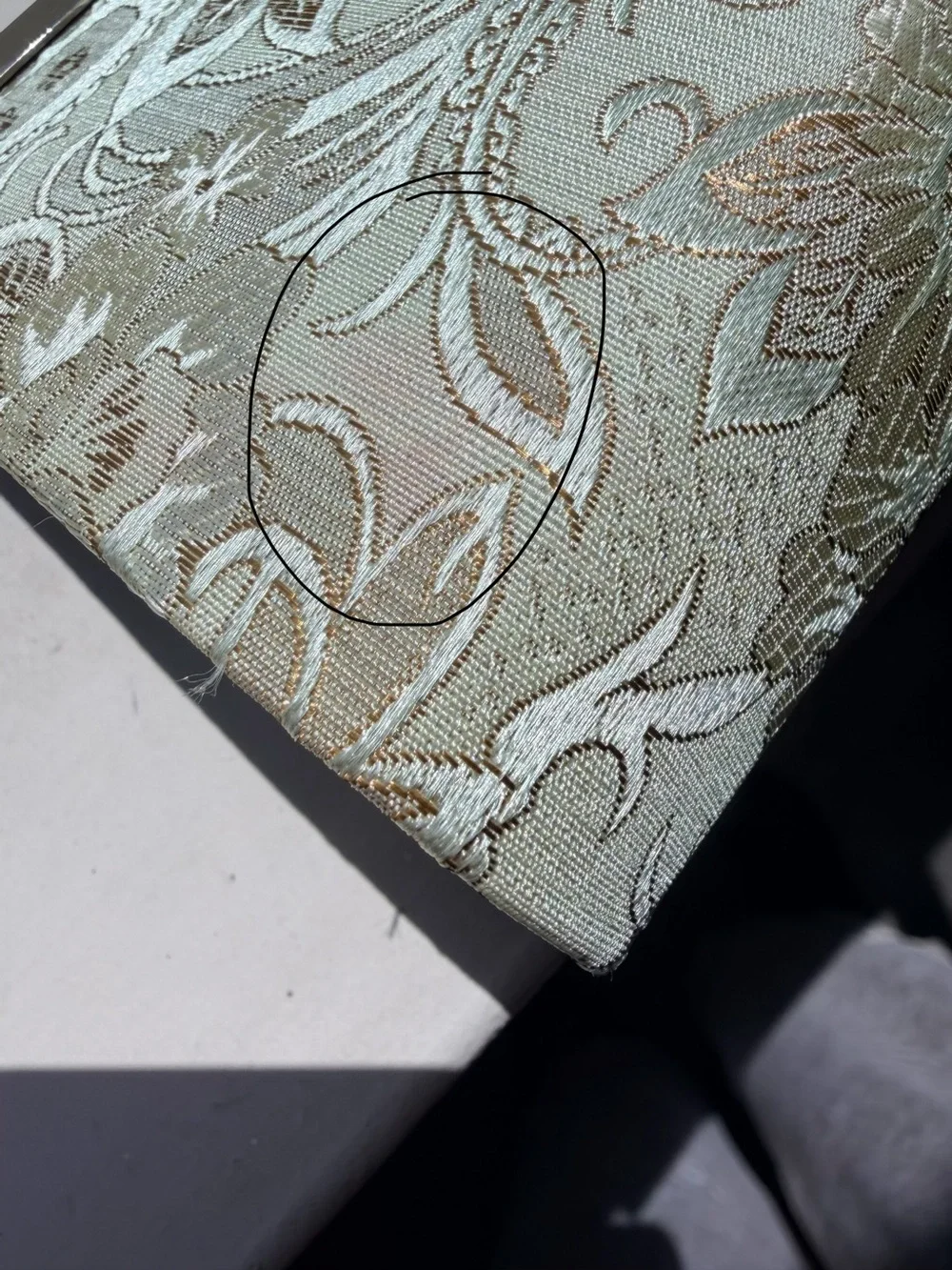 Viintage-style evening clutch features gold/green floral damask metal kiss lock